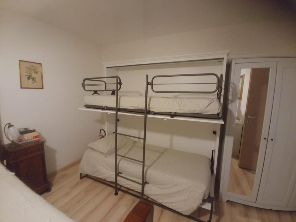 Postel nebo postele na pokoji v ubytování Balcone dei Limoni