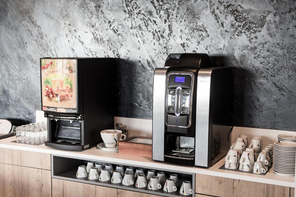 Příslušenství pro přípravu čaje a kávy v ubytování ATOLON PARK HOTEL