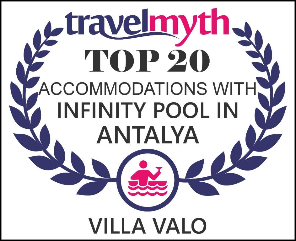 un cartel que dice Traveliji alojamiento superior con piscina infinita en villa v en Villa Valo, en Kalkan