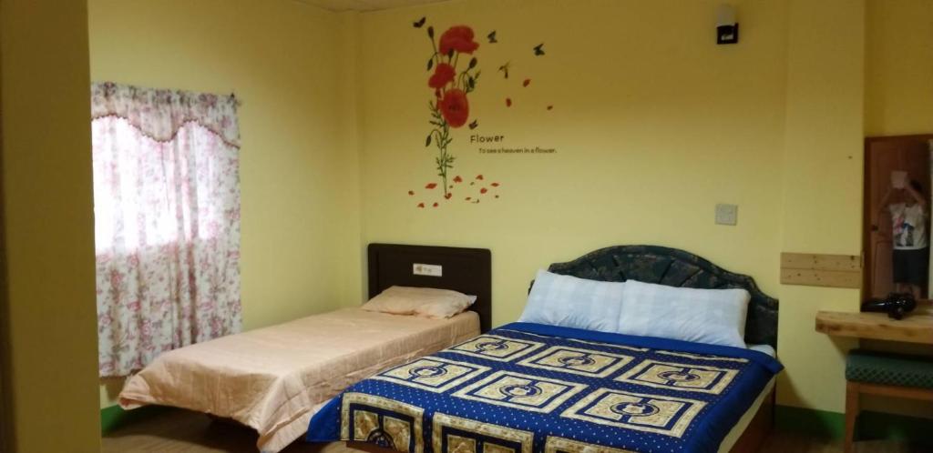 Postel nebo postele na pokoji v ubytování Pthles Guest house