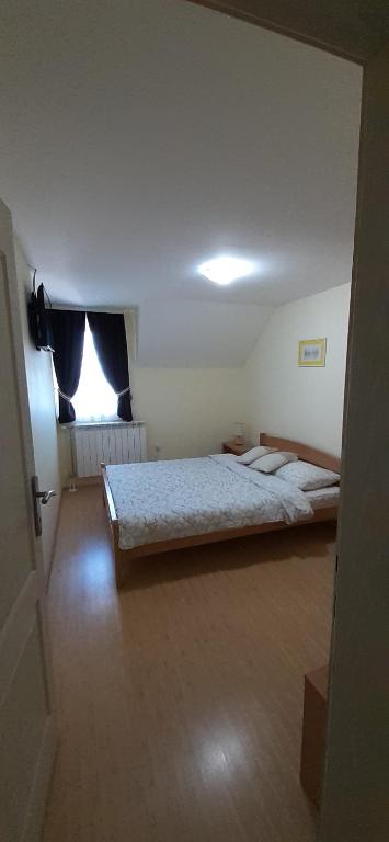 Ένα ή περισσότερα κρεβάτια σε δωμάτιο στο Apartments Villa Stars