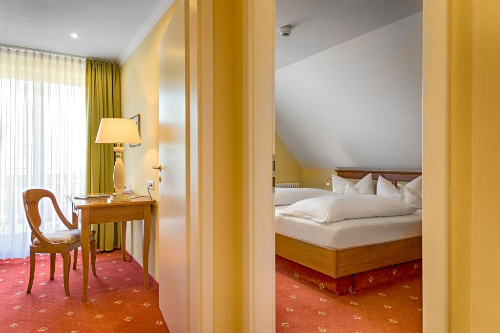 Postel nebo postele na pokoji v ubytování Hotel Thomahof