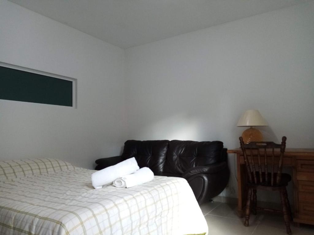 Postel nebo postele na pokoji v ubytování Milenio III B&B