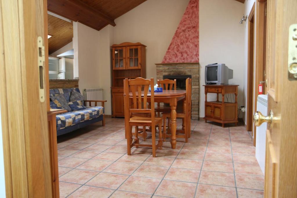 TV a/nebo společenská místnost v ubytování Hostal La Plaza