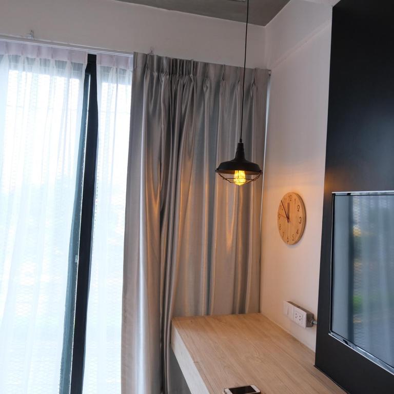 Postel nebo postele na pokoji v ubytování Bonne Nuit Hotel, Hua Hin