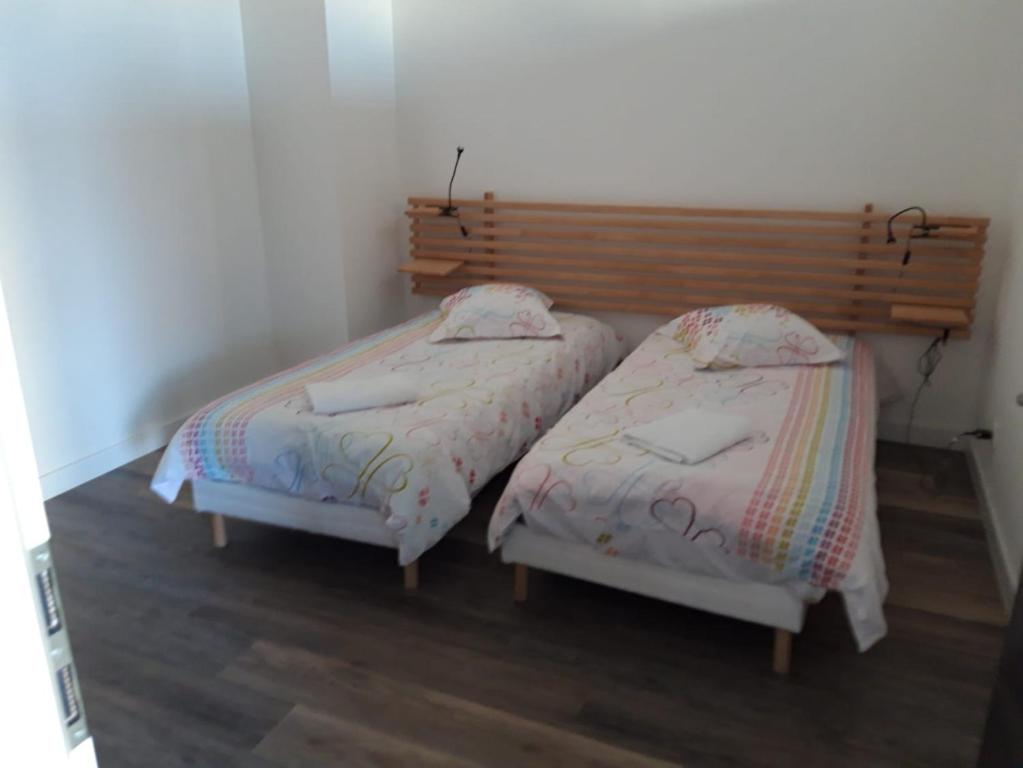 Postel nebo postele na pokoji v ubytování Gîte De La Ferme