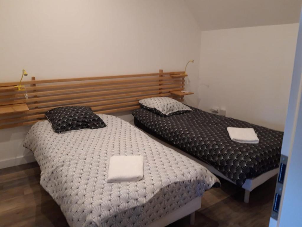 Postel nebo postele na pokoji v ubytování Gîte De La Ferme