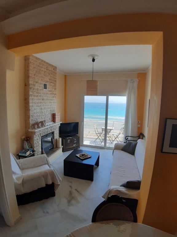 Posezení v ubytování Apartment Michalis by the Sea