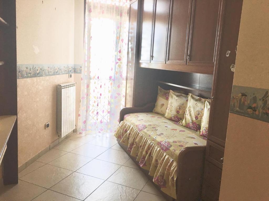 Postel nebo postele na pokoji v ubytování B&B LA PIETRA