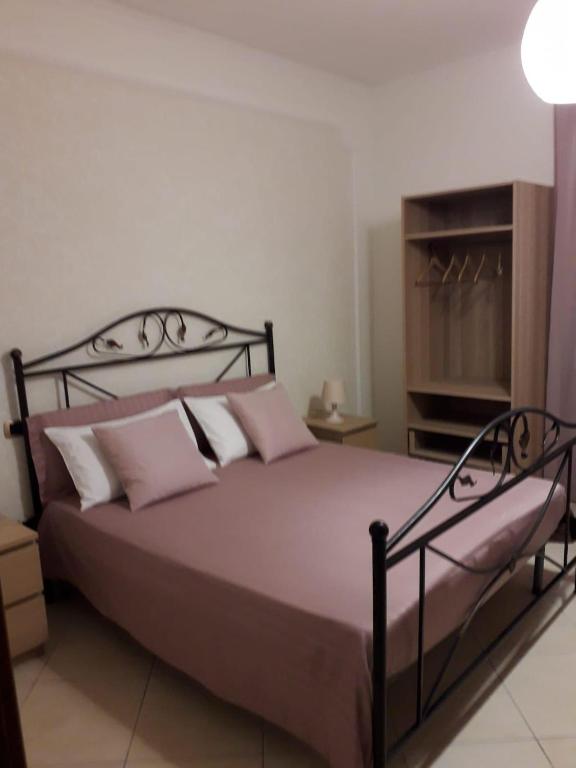 Postel nebo postele na pokoji v ubytování B&B LA PIETRA