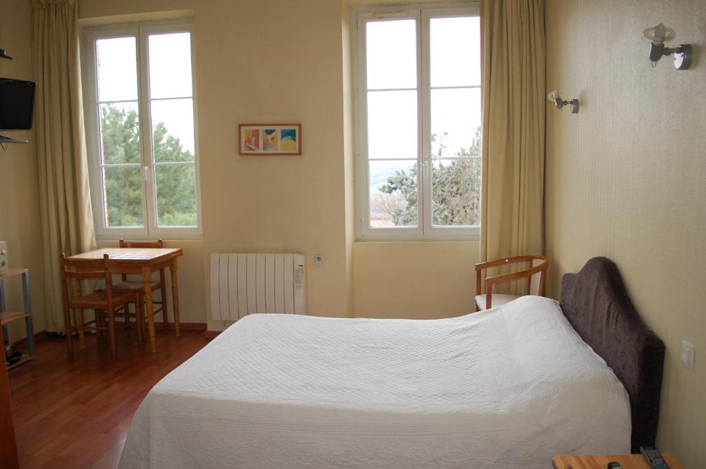 Letto o letti in una camera di Chateau de Faudade