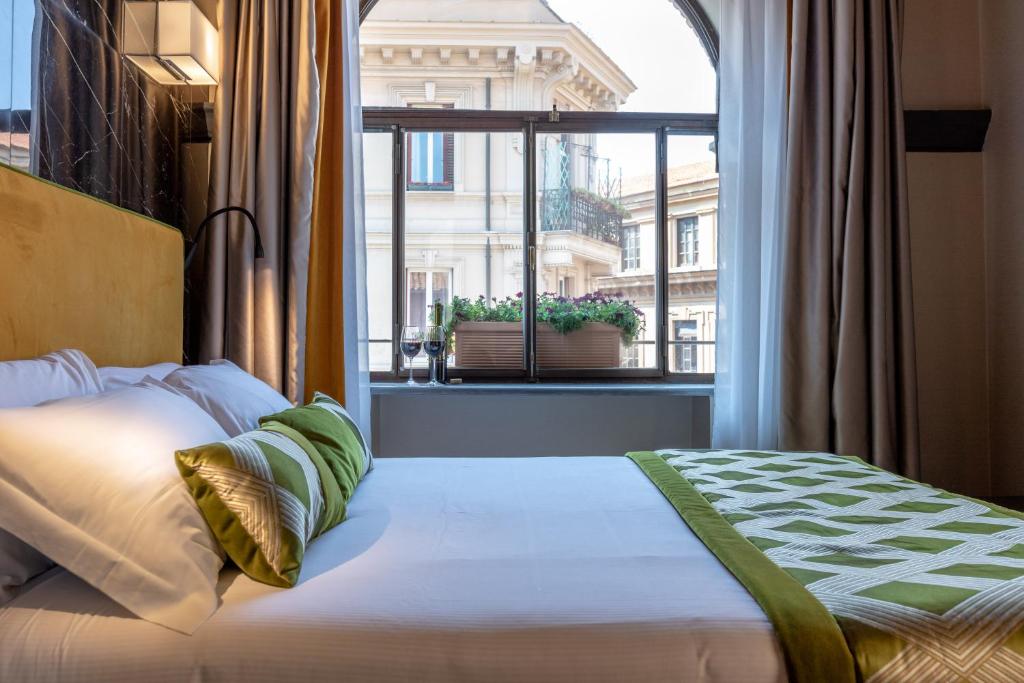 Кровать или кровати в номере NEMAN Maison Experience I Pantheon