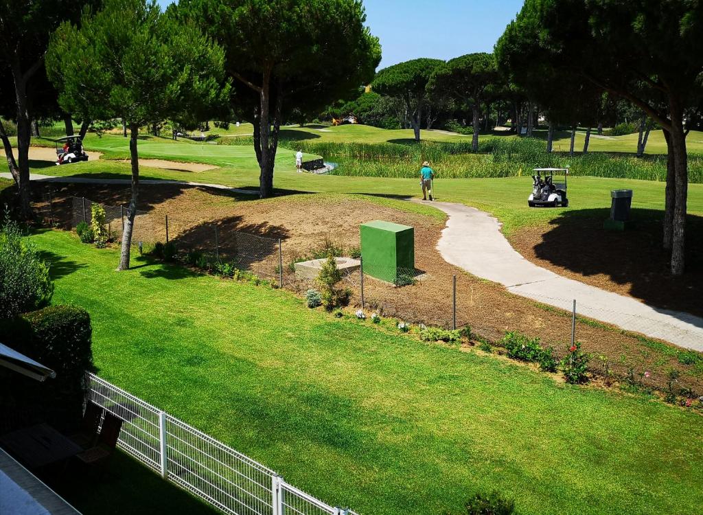 a person riding a bike in a park at Indo en OGGOB com in Chiclana de la Frontera