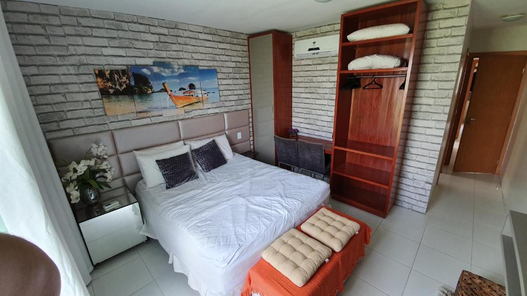 Voodi või voodid majutusasutuse Condomínio Raízes Marina toas