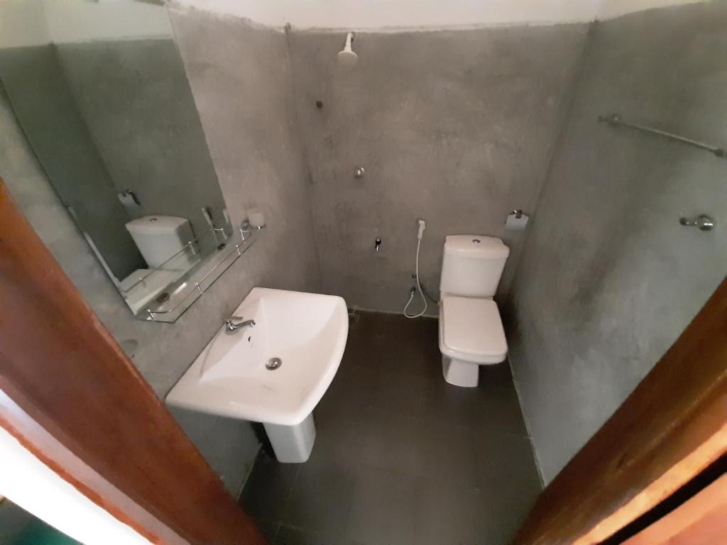 Koupelna v ubytování Priya Homestay Kandalama