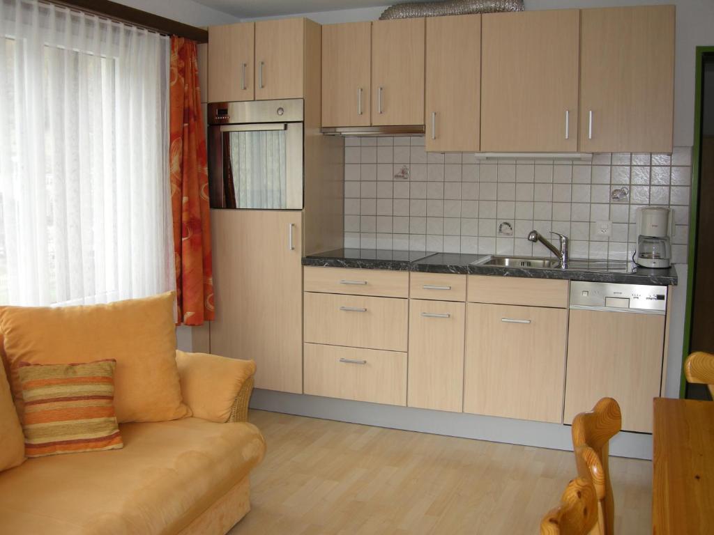 Kuchyň nebo kuchyňský kout v ubytování Apartments Atlas