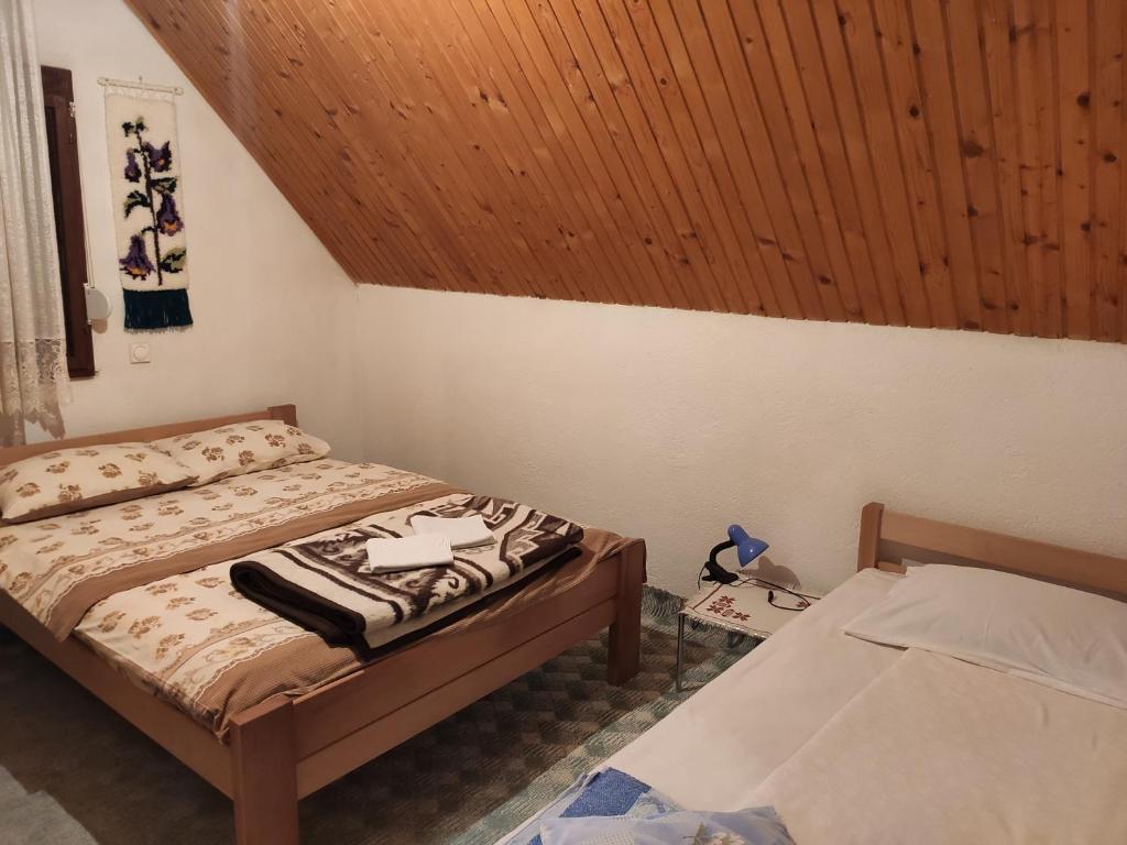 Postel nebo postele na pokoji v ubytování Sobe KALJEVIĆ