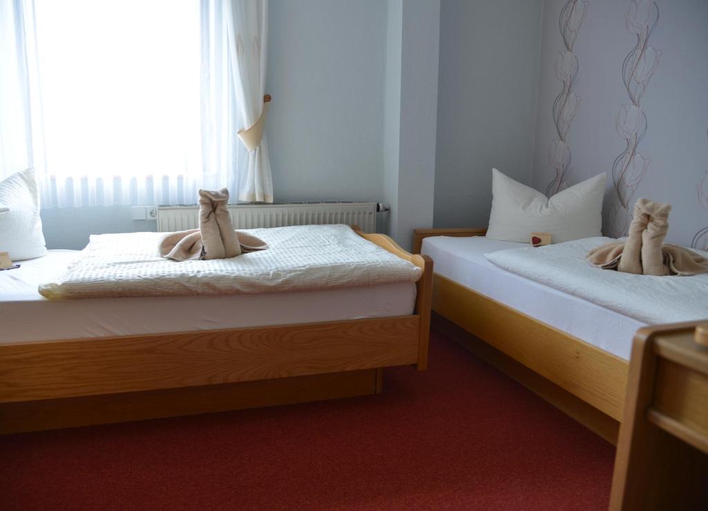 Postel nebo postele na pokoji v ubytování Goldene Krone