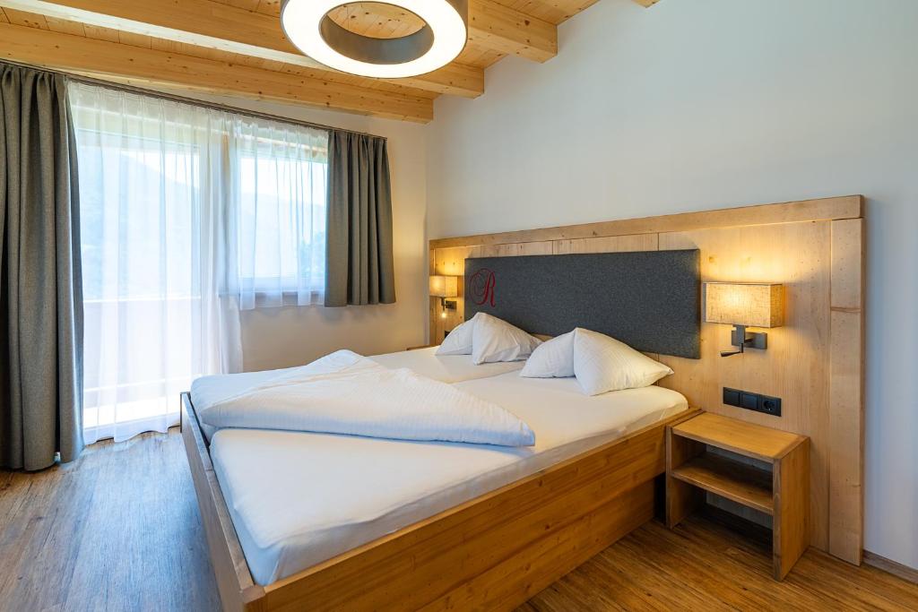 Hotel Garni Romantikにあるベッド