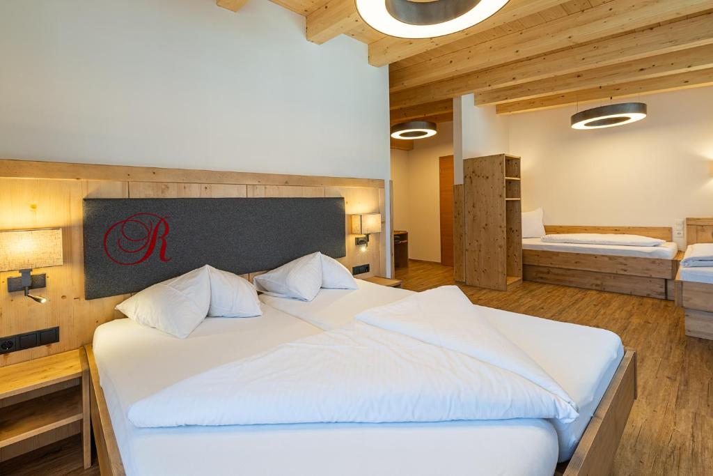 Hotel Garni Romantikにあるベッド