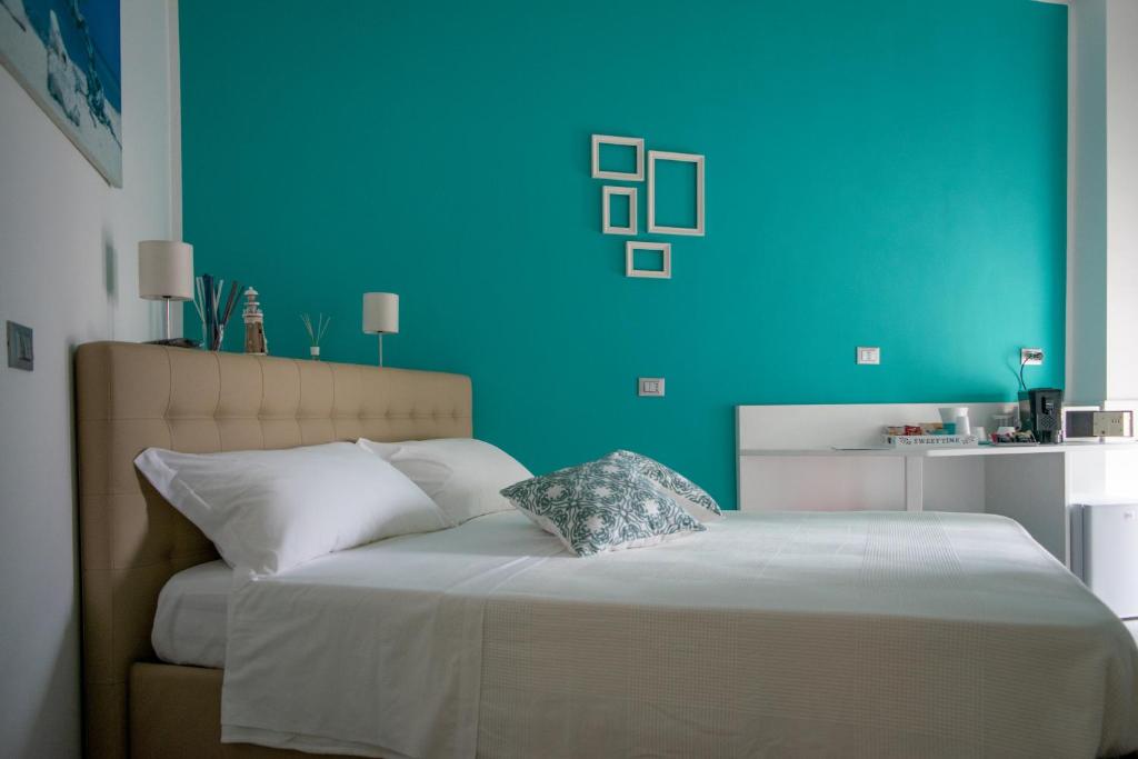 Postel nebo postele na pokoji v ubytování Dimora Chlóe B&B