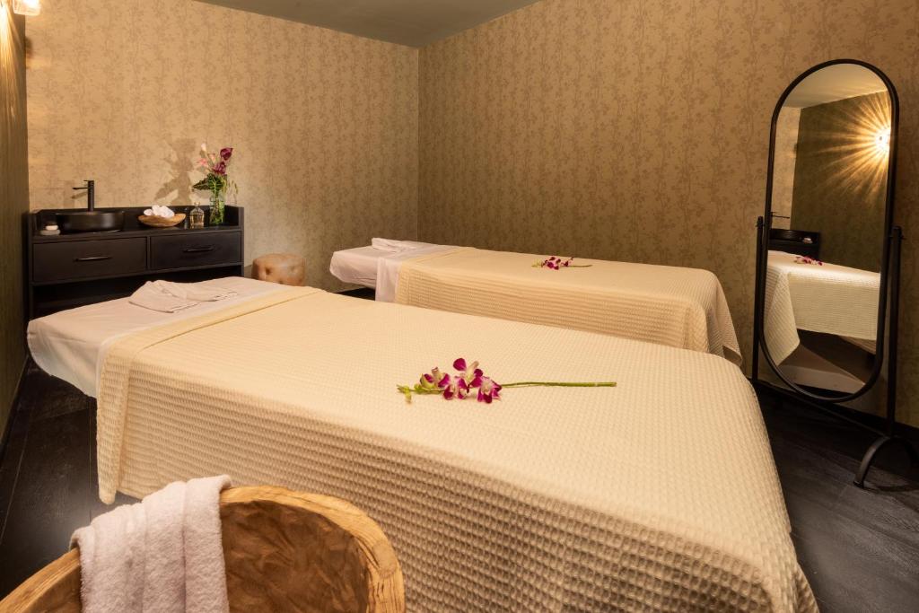Postel nebo postele na pokoji v ubytování Bachar House