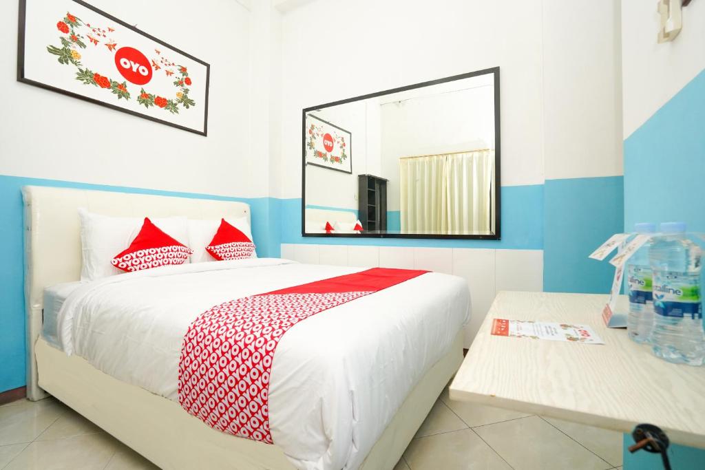Booking.com: OYO 662 Miracle Homestay Syariah , Surabaya, Indonésie .  Réservez votre hôtel dès maintenant !