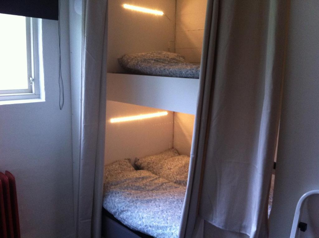 Postel nebo postele na pokoji v ubytování Trehörna Hotell & Konferens