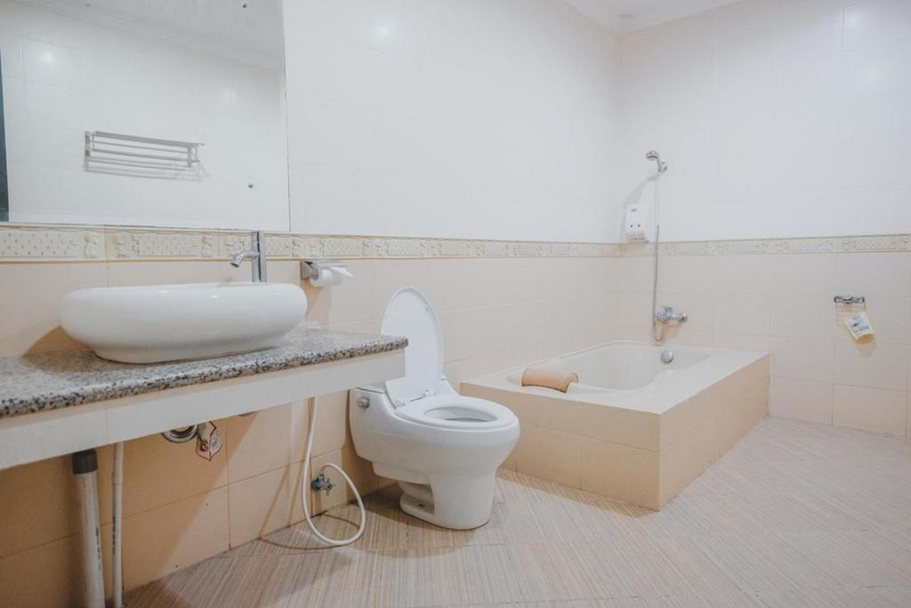 Koupelna v ubytování RedDoorz Premium @ Jalan Pal 10 Jambi