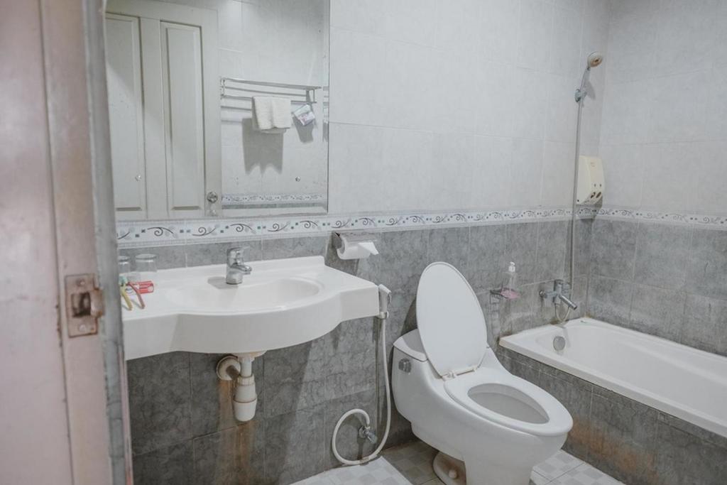 Koupelna v ubytování RedDoorz Premium @ Jalan Pal 10 Jambi