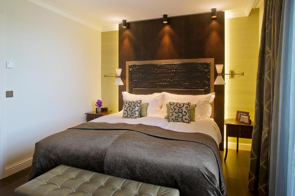 Postel nebo postele na pokoji v ubytování Hotel Villa Honegg