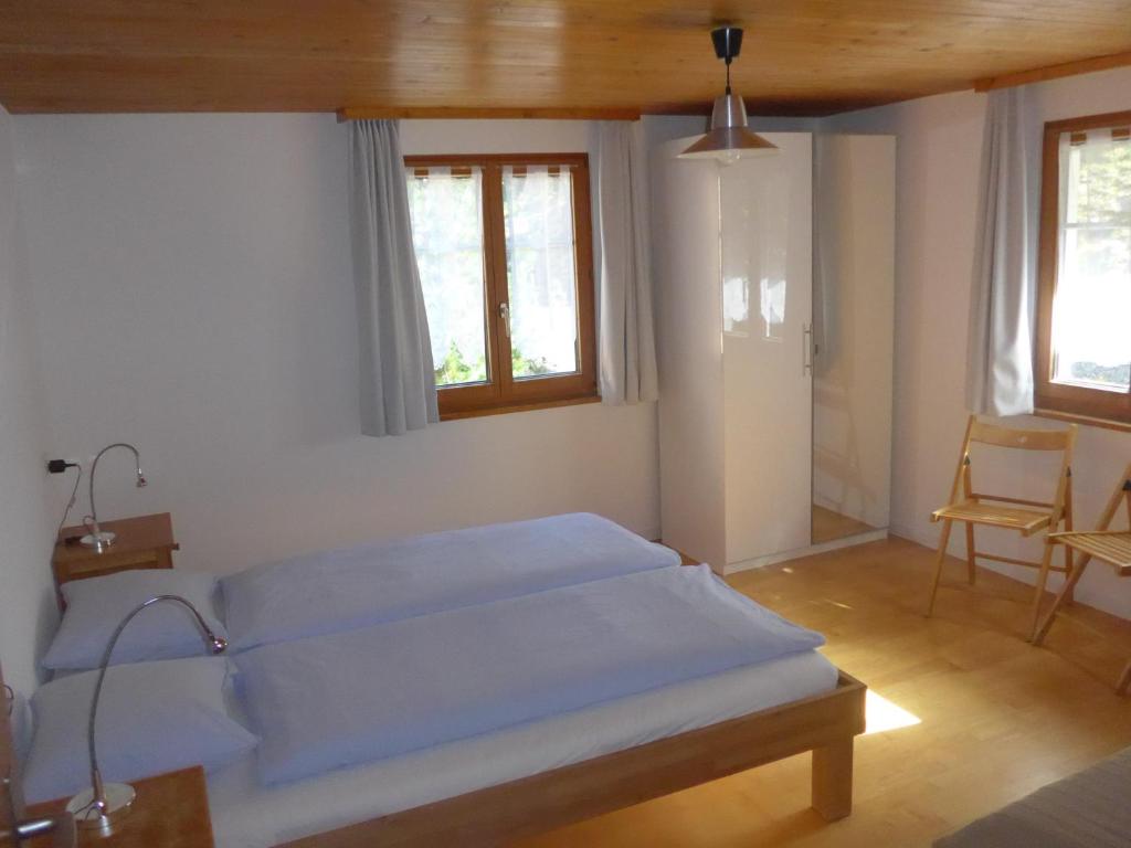 Postel nebo postele na pokoji v ubytování Apartment Dorfblick