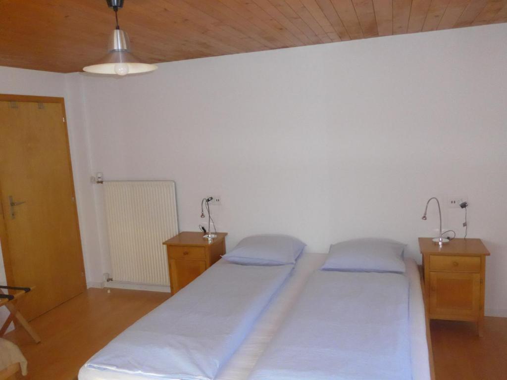 Postel nebo postele na pokoji v ubytování Apartment Dorfblick