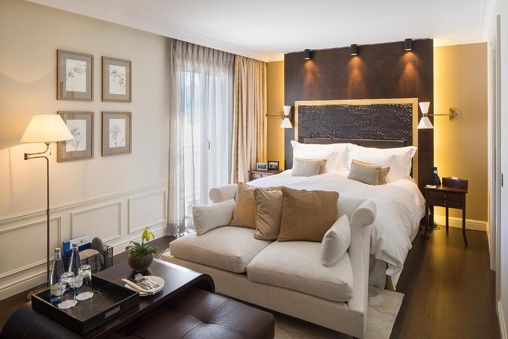 Postel nebo postele na pokoji v ubytování Hotel Villa Honegg
