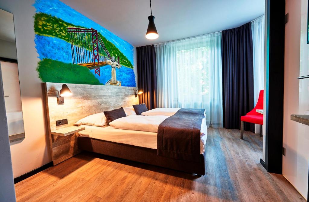 Postel nebo postele na pokoji v ubytování Urban Home Hotel
