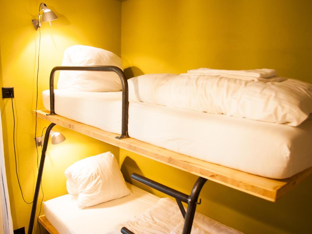 Postel nebo postele na pokoji v ubytování Nangijala Guest House