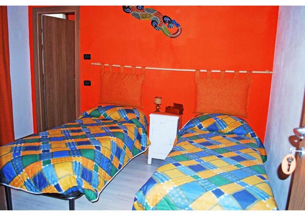 Postel nebo postele na pokoji v ubytování B&B I Viandanti