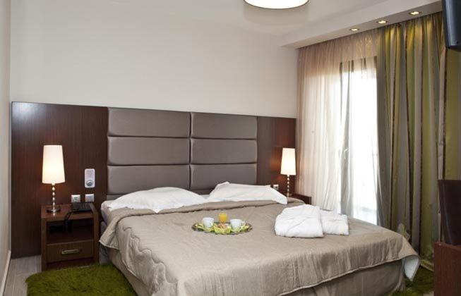 Posteľ alebo postele v izbe v ubytovaní Hotel Konaki