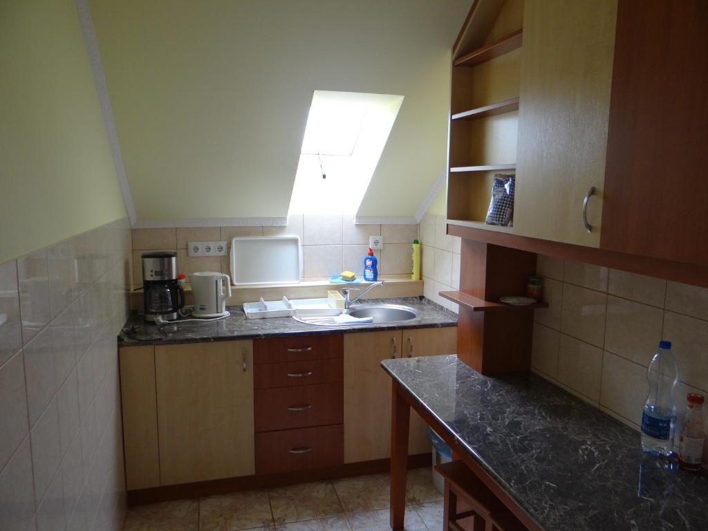 Kuchyň nebo kuchyňský kout v ubytování Marinica Apartman