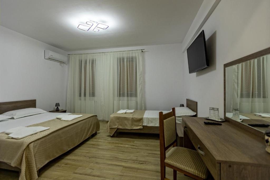 Rúm í herbergi á Airport House