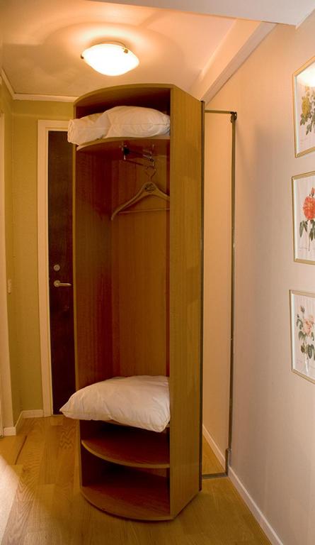 Postel nebo postele na pokoji v ubytování Hotel Vännäs