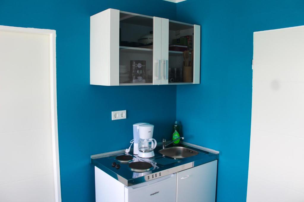 Kuchyň nebo kuchyňský kout v ubytování Skyhostel Friedrichshafen