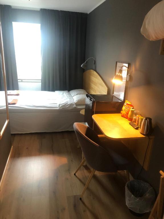 Postel nebo postele na pokoji v ubytování Hotel Lapland River