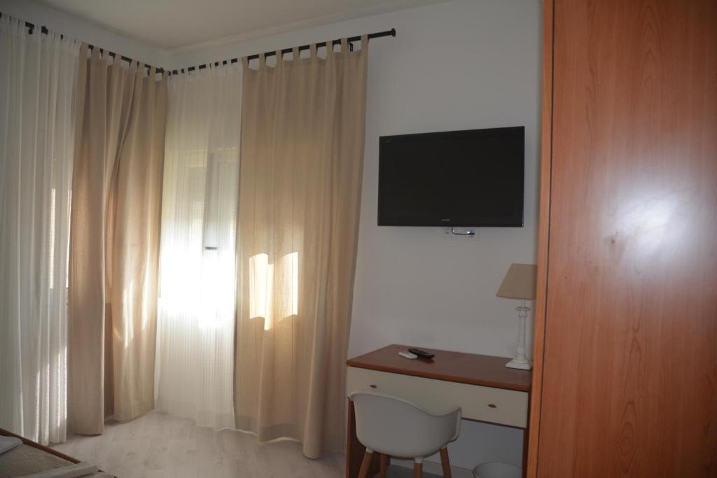 A television and/or entertainment centre at ART B&B