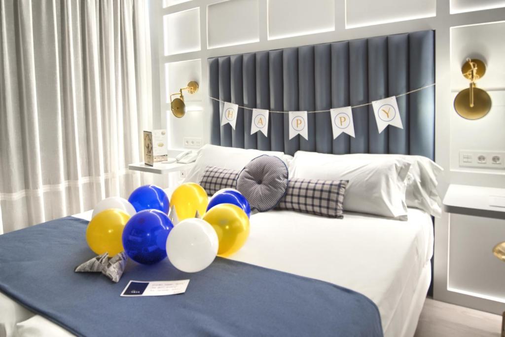 Postel nebo postele na pokoji v ubytování Hotel Luze El Villa