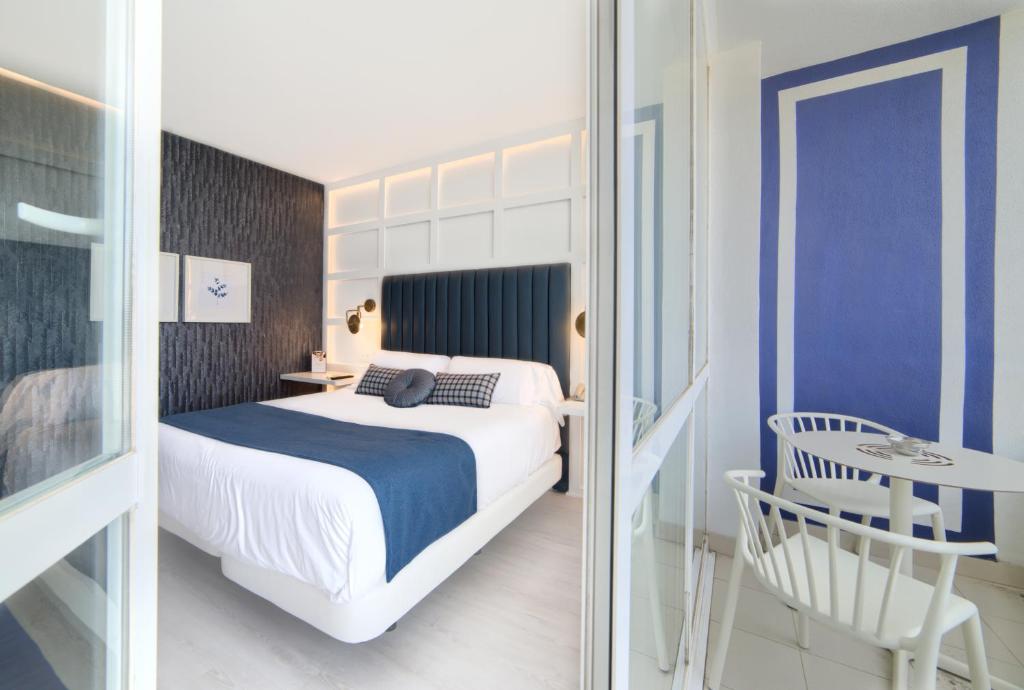 Postel nebo postele na pokoji v ubytování Hotel Luze El Villa