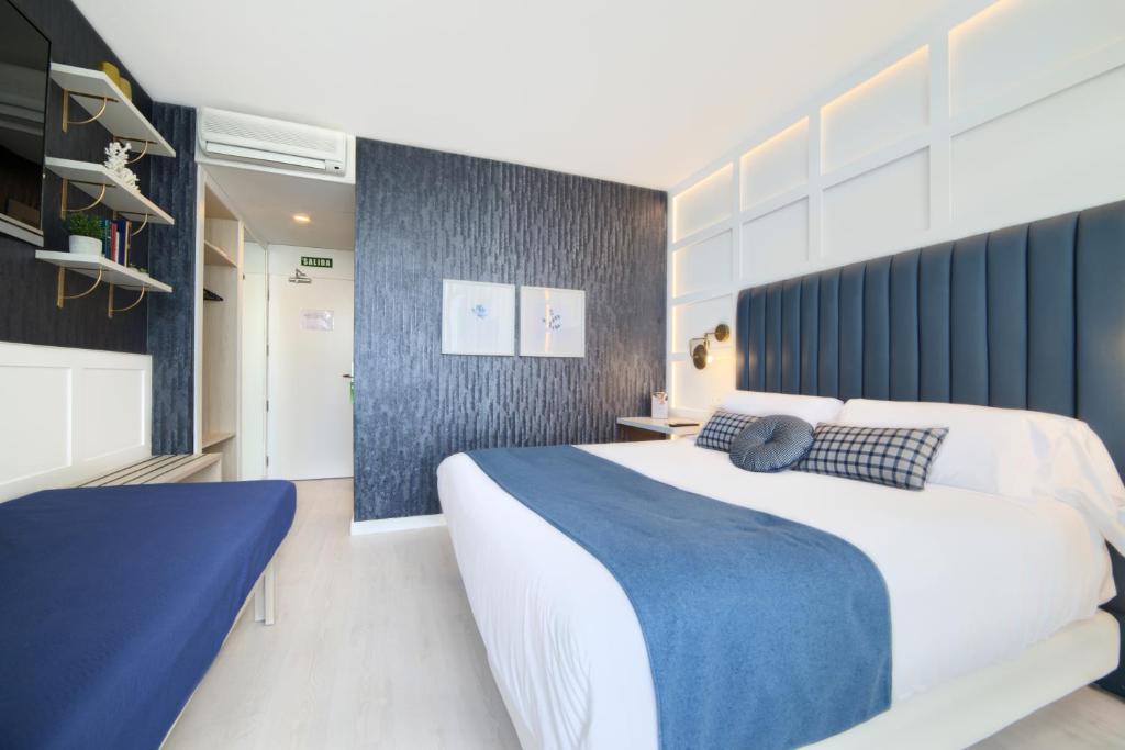 Postel nebo postele na pokoji v ubytování Hotel Luze El Villa