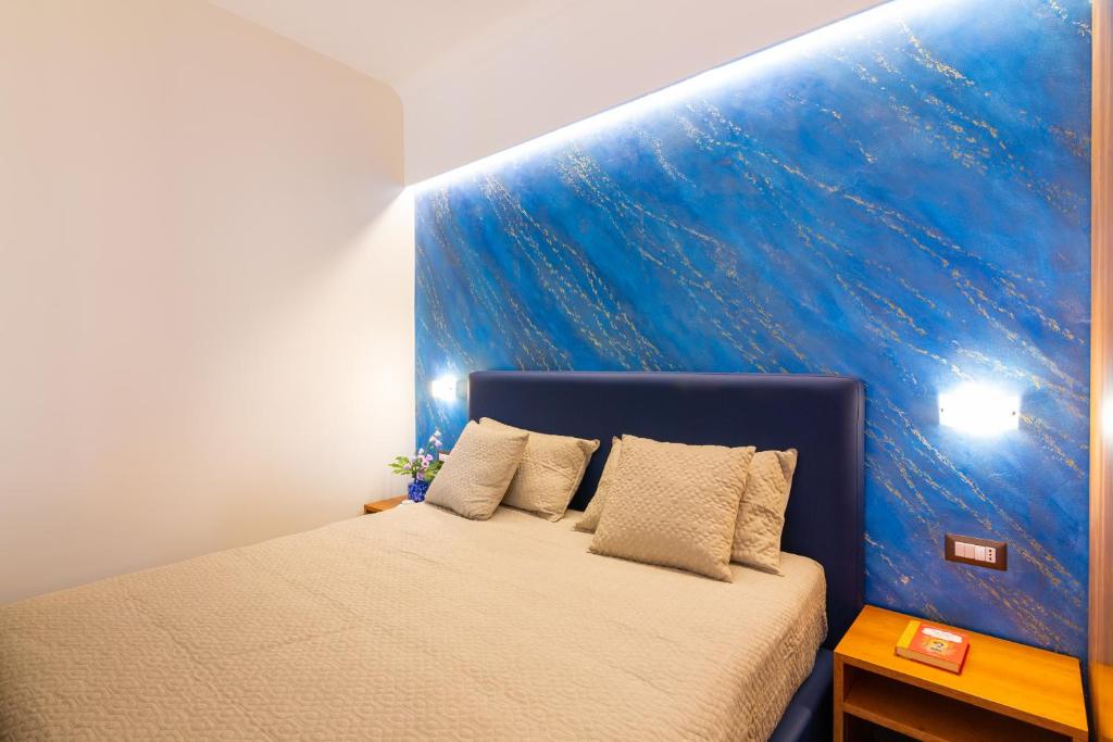 Postel nebo postele na pokoji v ubytování Il Melograno Relais