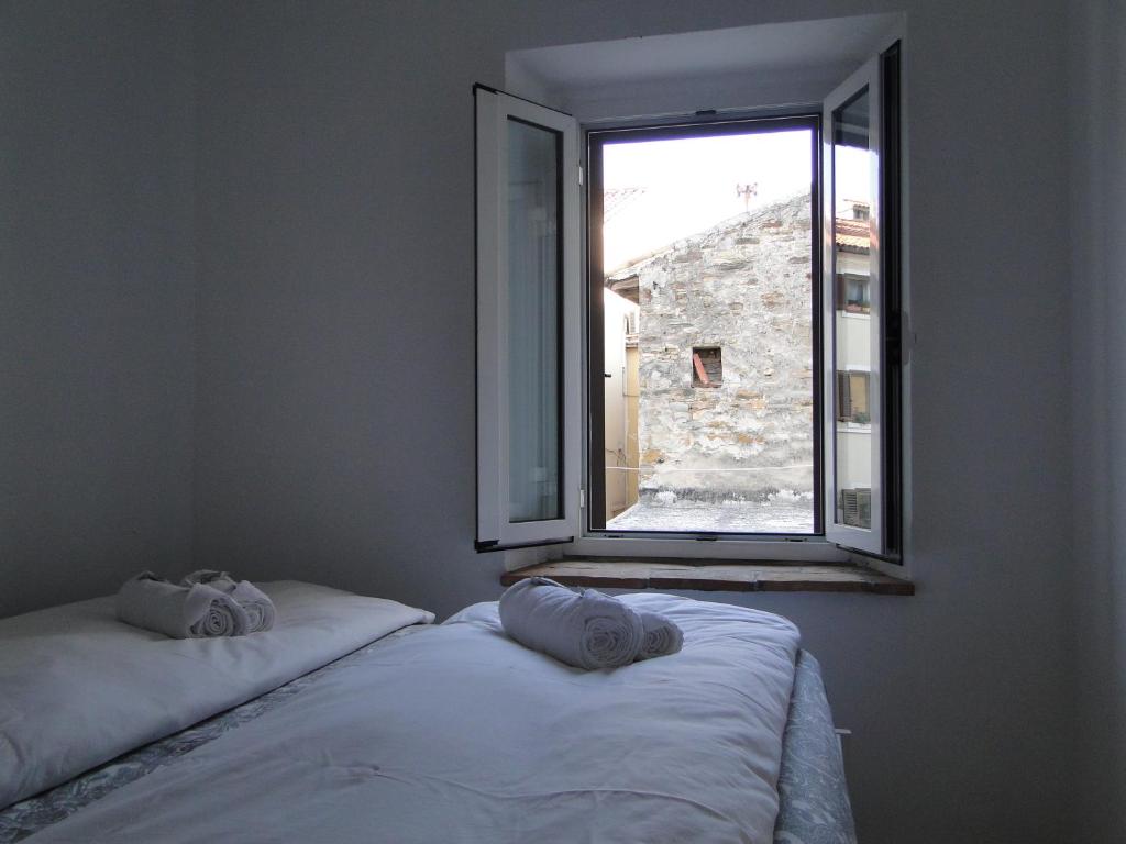 Кровать или кровати в номере Apartma Na terasi