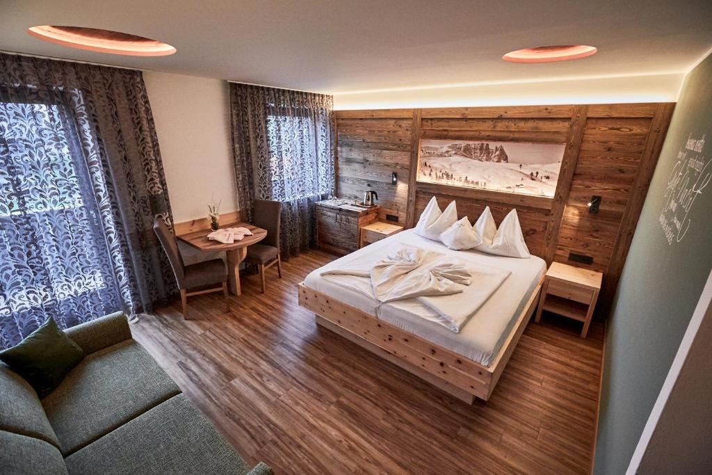 Postel nebo postele na pokoji v ubytování Hotel Garni Savoy - new opening